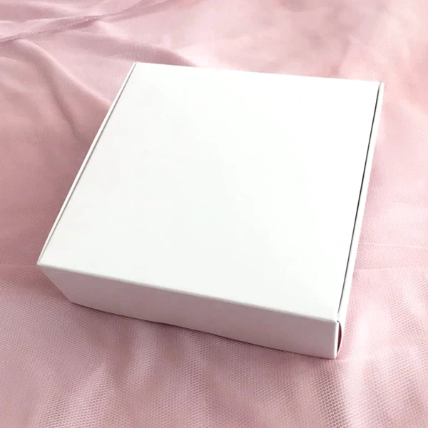 white glossy boxes